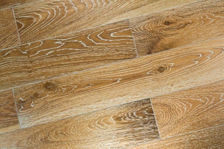 close shot of grooves of hardwood floor